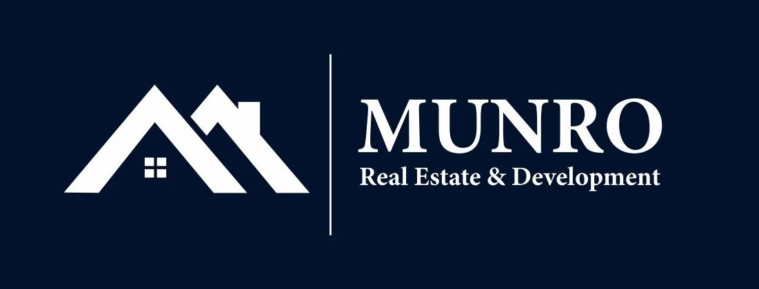 company logo for alexander munro, ypsilanti realtor