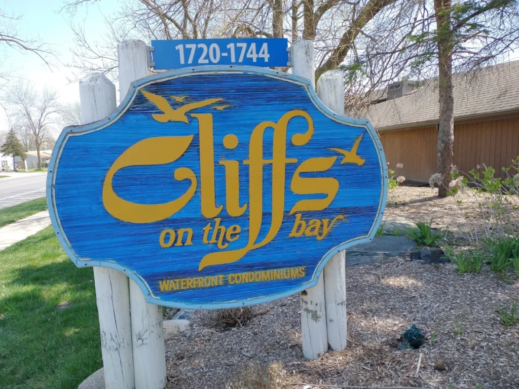 cliffs on the bay's entry sign in ypsilanti